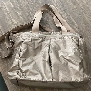 Gold Lesportsac baby bag
